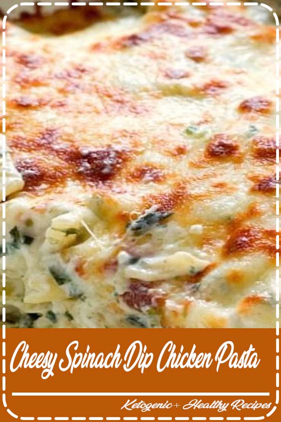 Cheesy Spinach Dip Chicken Pasta – your new favorite dinner! Spinach dip and pasta get together to create one cheesy and creamy dish! You need to make it!