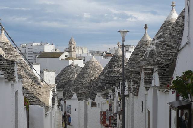 Alberobello, the city of drystone dwellings known as trulli , is an exceptional example of vernacular architecture. It is one of the best preserved and most homogeneous urban areas of this type in Europe. Its special features, and the fact that the buildings are still occupied, make it unique. It also represents a remarkable survival of prehistoric building techniques.