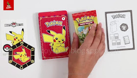 Pack 1 Pikachu Showing Contents Inside from McDonalds Pokemon 2023 including 1 box featuring Pikachu, 1 booster pack of four cards, 1 pikachu sticker, 1 scarlet pikachu coin and a how to play instruction leaflet