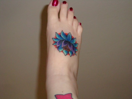 flower tattoo designs for feet