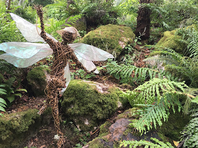 fairy in mossy garden