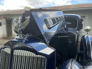 Hood panels raised on 1936 Packard Eight wear decorative trim