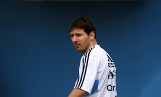 Lionel Messi in white shirt