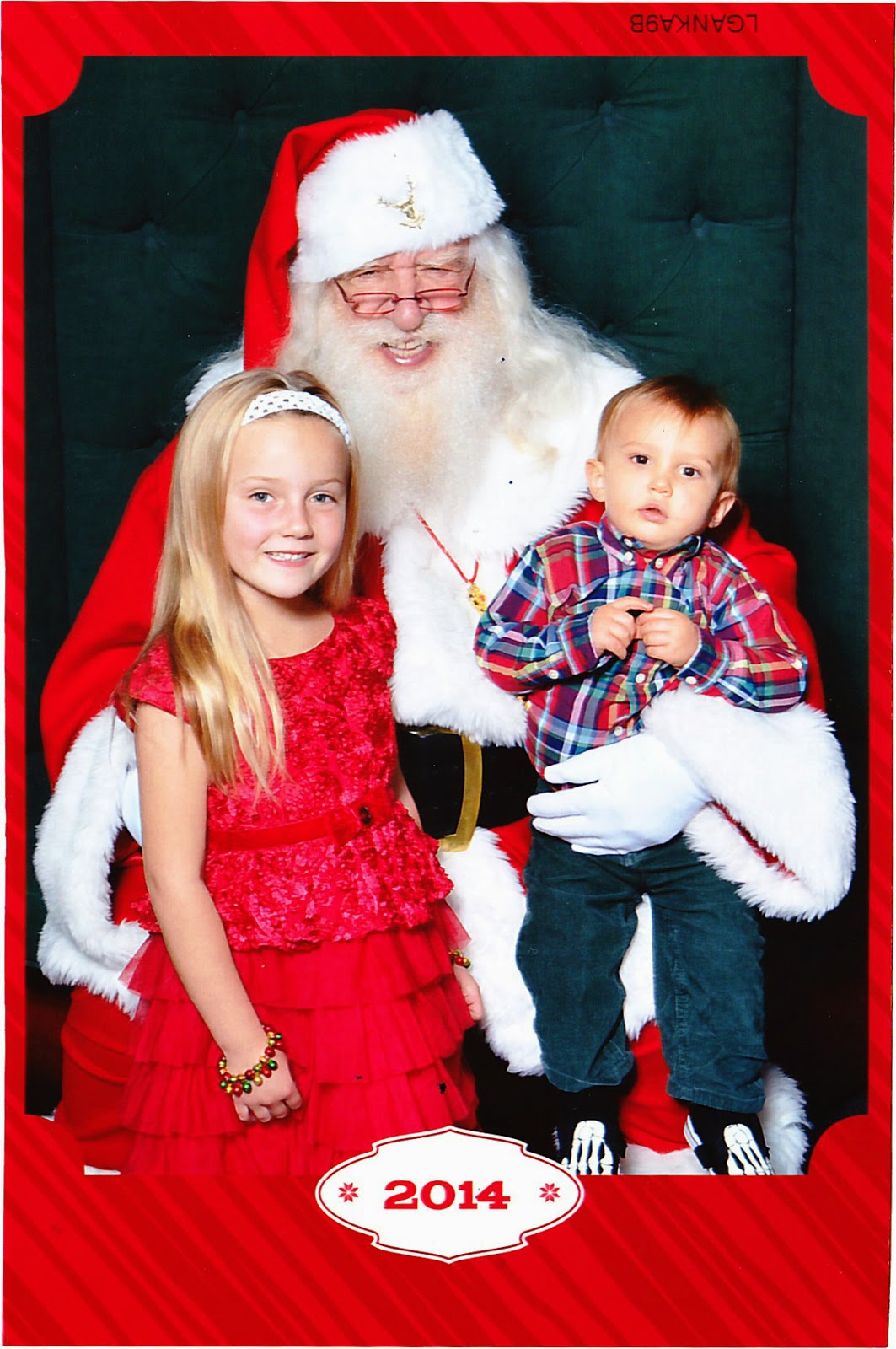 Cousin Belle and Reef Indy with the Mall Santa.
