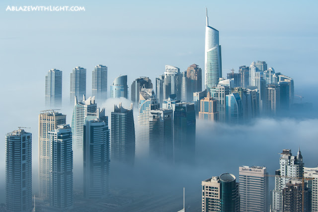 Photo of Dubai Marina buildings in the fog