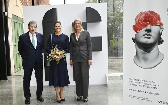 Crown Princess Victoria wore a new navy Billie top from By Malina, and navy Anissa skirt from By Malina. Brain Day 2022