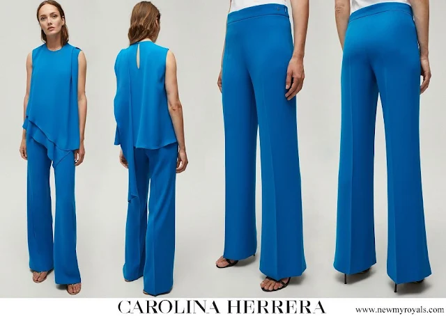 Queen Mathilde wore Carolina Herrera crepe straight leg pants in blue