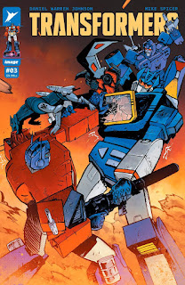 The cover to Transformers #3 feature two transforming robots in hand-to-hand combat!