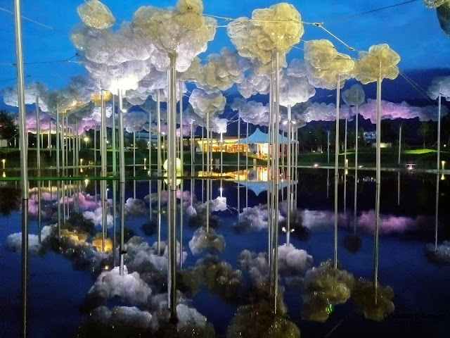 Crystal Cloud above the black Mirror Pool with over 800,000 hand-mounted Swarovski crystals