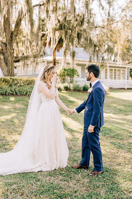 bride and groom crying happily after seeing each other