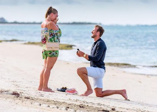 Harry Kane on one knee while proposing Katie Goodland