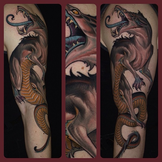 tattoo of merged snake with wolf making a dragon-like animal