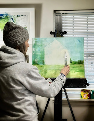 New England artist Karri Allrich painting in her studio, using oils and cold wax, winter 2024.