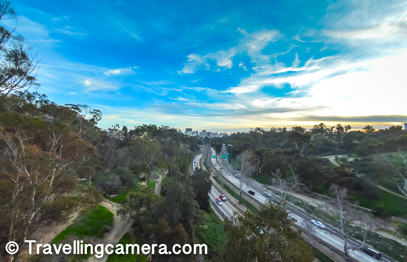 There is a beautiful walk from San Diego Zoo towards Downtown through Balboa Park and as you exit main gate of Balboa park, you cross a bridge which offers above view of the highway which goes towards Los Angles. 