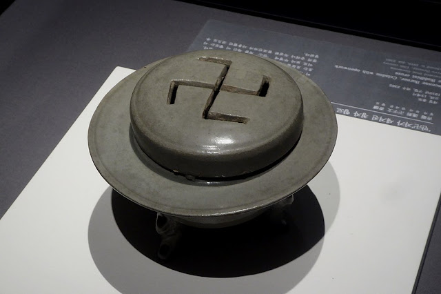 Gray incense burner with large swastika on the top, from the Goryeo dynasty.