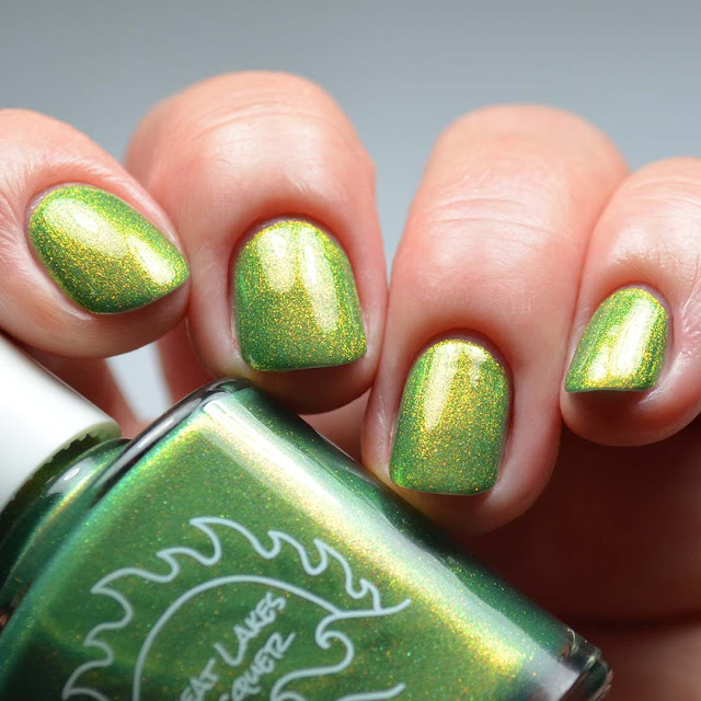 green shimmer nail polish swatch different angle