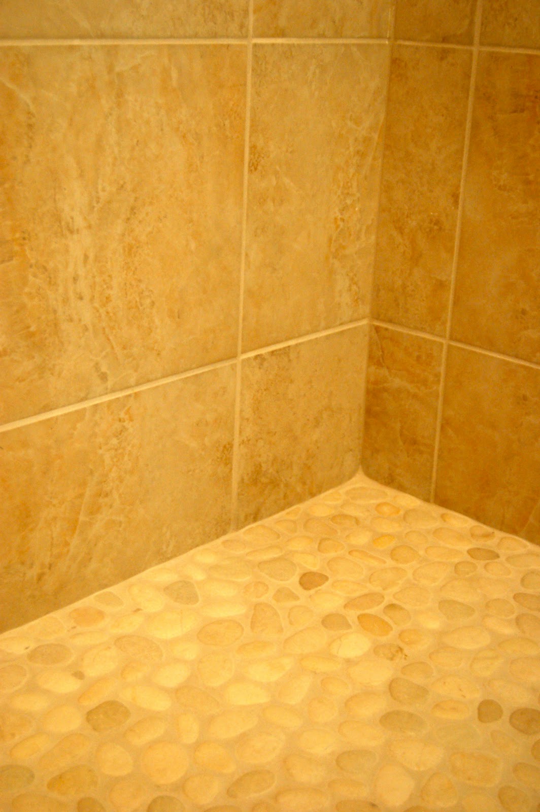 bathroom shower heads also had a teak seat installed that folds up and down. It supposedly 
