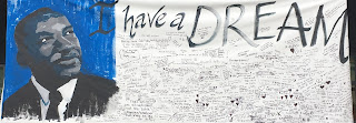 Banner with painting of Dr. Martin Luther King, Jr and student notes