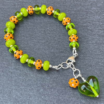 Handmade lampwork glass bead bracelet by Laura Sparling