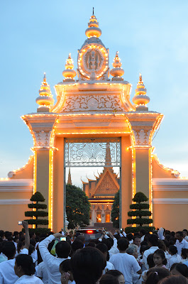 Return of body of King Norodom Sihanouk, crowd at Victory Gate of the Royal Palace, Phnom Penh, Cambodia