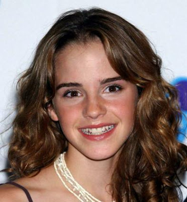 Emma Watson Eye Color. Medium curly auburn color