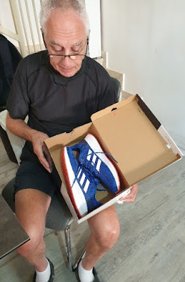 Senior receives new sneakers donated from Israel Relief Aid