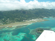 Enjoy the view from above Mahe Island, the international airport in the . (sez airport view )