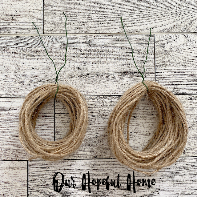 two sets jute string rings held together by floral wire