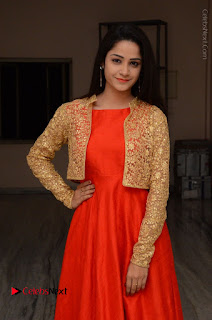 Telugu Actress Divya Nandini Stills in Orange Sleeveless Gown at Chennai Chaitrama Movie le Launch Event  0001.JPG