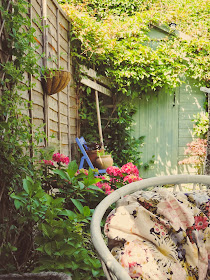 Rustic garden with duck egg painted shed