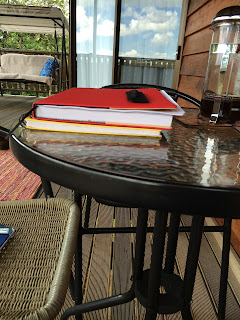 notebooks on veranda ready for writing