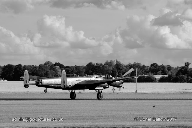 Lancaster aircraft at Duxford taking off