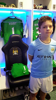 Young fan in the Manchester City dressing room