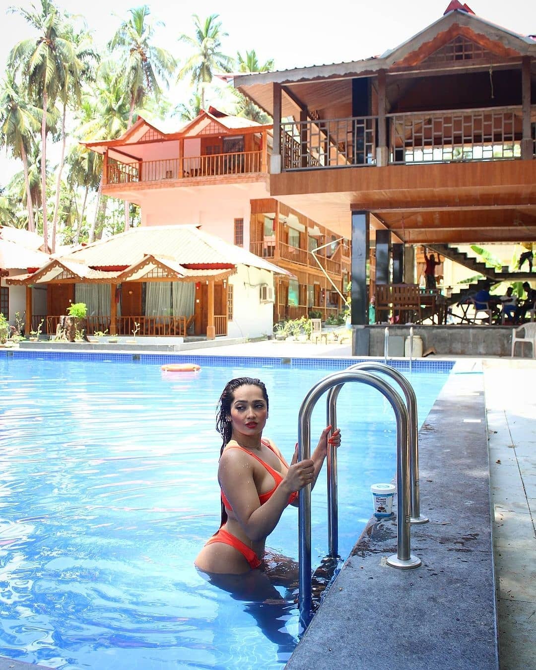Aditi Mistry Hot In Orange Swimsuit Photos