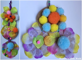 Spring window craft with pom poms