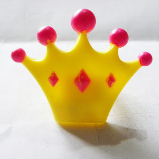 Yellow and pink crown ring from Greggs