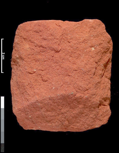 Rock specimen of sandstone from Bloody Mires Quarry, Kippen Muir, Central Region, Scotland.  Sample of red sandstone, showing uniform grainsize and colour. This specimen is of Devonian age. British Geological Survey Petrology Collection sample number MC2092. This sample is from an abandoned quarry which may have been used for local building stone. Red sandstone was commonly used in Scotland from the late 19th century. The largest and most significant quarries of red sandstone in Scotland were in Ayrshire and Dumfriesshire, from where the stone was transported by railway.