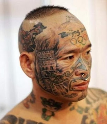 face tattoos. Weird Face Tattoos