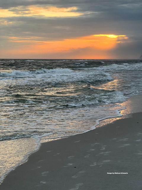 Cloudy sunset on the coast in Gulf Shores, Alabama.