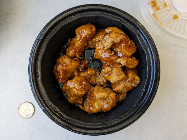 A 10-piece order of KFC Sticky Chicky Saucy Nuggets.