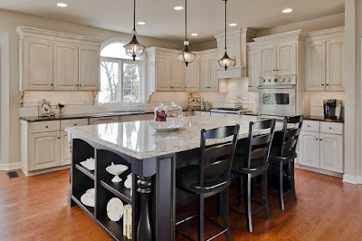 kitchen island with granite top and seating
