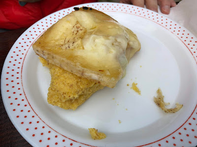 Polenta with melted cheese (polenta con formaggio alla piastre).