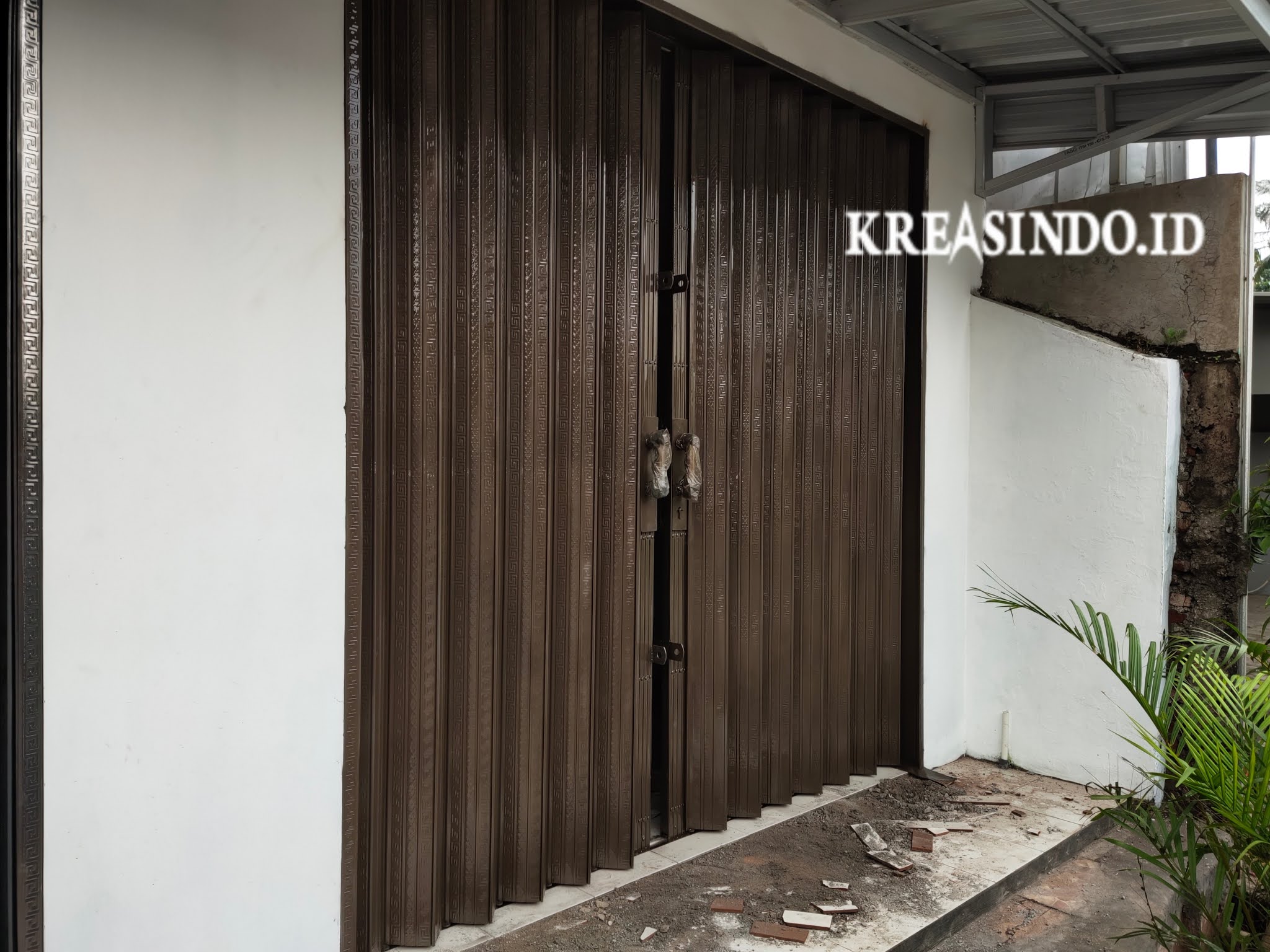 Folding Gate pemasangan di Jalan H Dimun Depok di Kios Bpk Rian