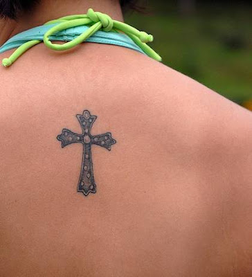 cross tattoo are a nice tattoo ideas for girls upper back