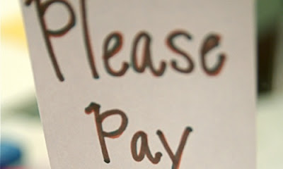 5 Reasons Why Guys Should Pay on the First Date note hand writing the word please pay