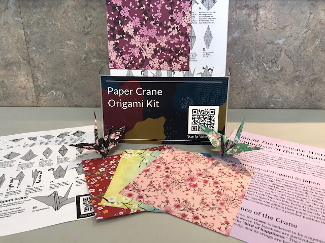 Beautiful floral origami paper and paper cranes with instructions on how to fold origami cranes.