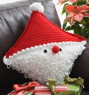 http://www.yarnspirations.com/pattern/crochet/santa-pillow