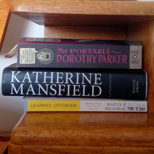 Three books on my bedside table; about three less than there is normally there. The books on my bedside table
