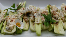 celery stuffed with hummus appetizer