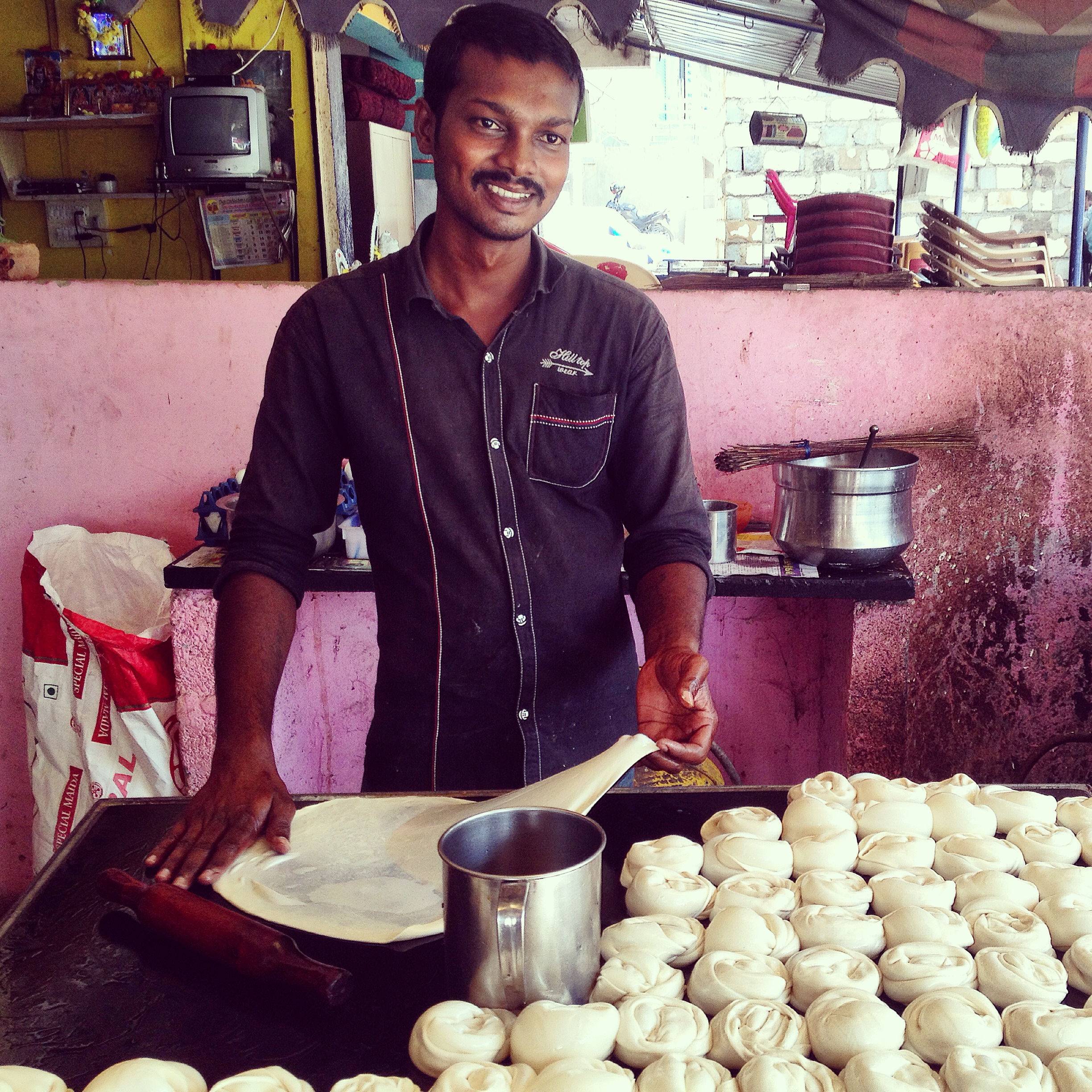 man making paratha at one of the best South Indian restaurants in Dubai